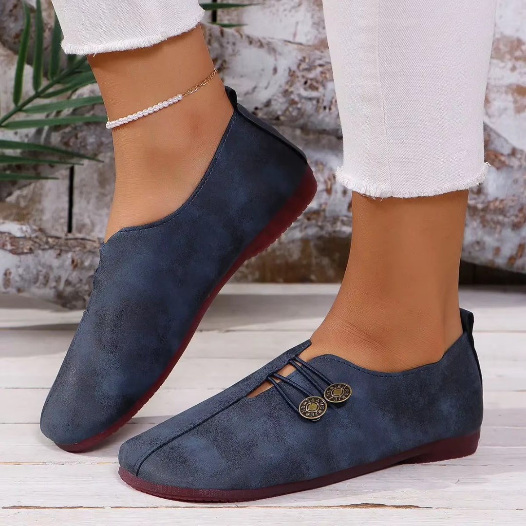 Ballerines Olivia bleu marine, vue de profil côté boutons-pression