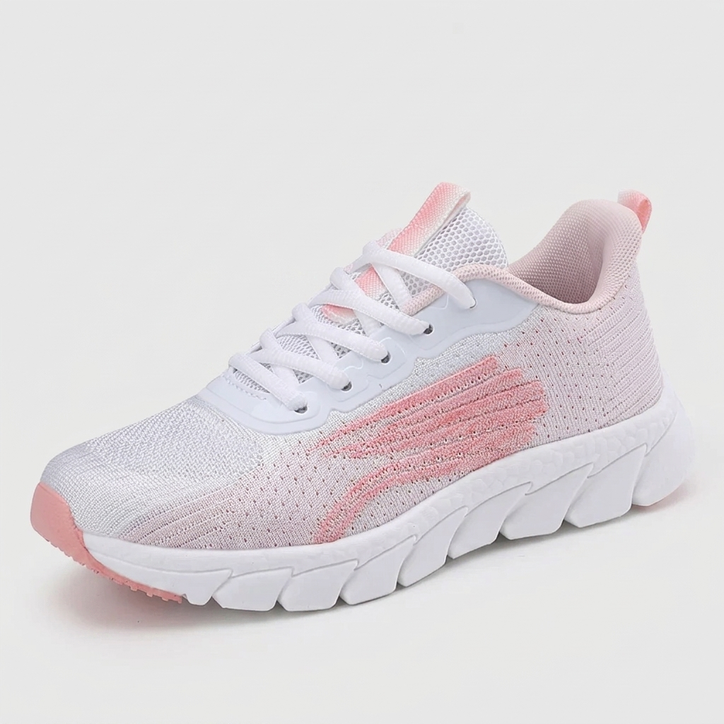 Gros plan basket femme blanche lacets roses en action sur piste