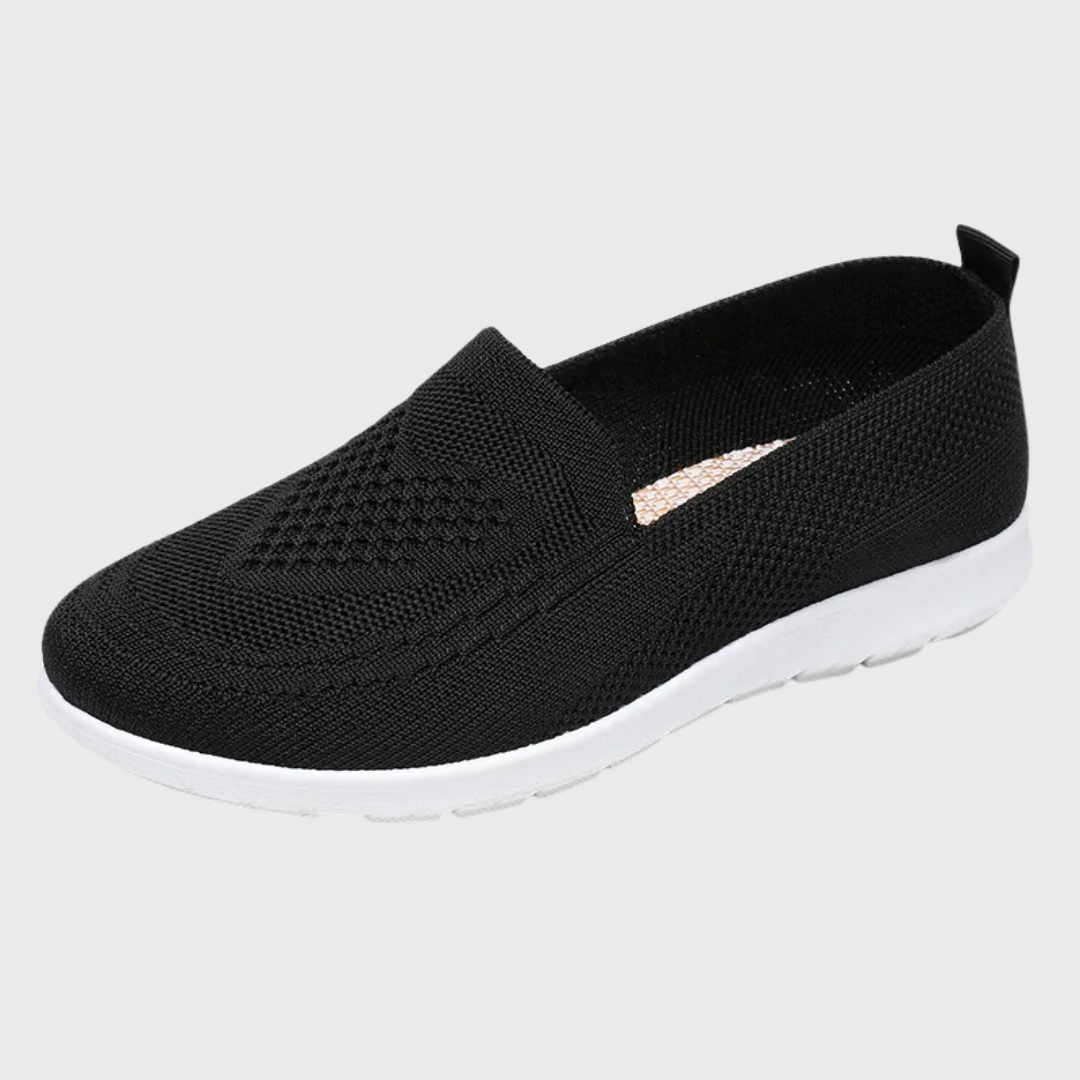 Chaussure slip-on noire en tissu tricoté, vue latérale