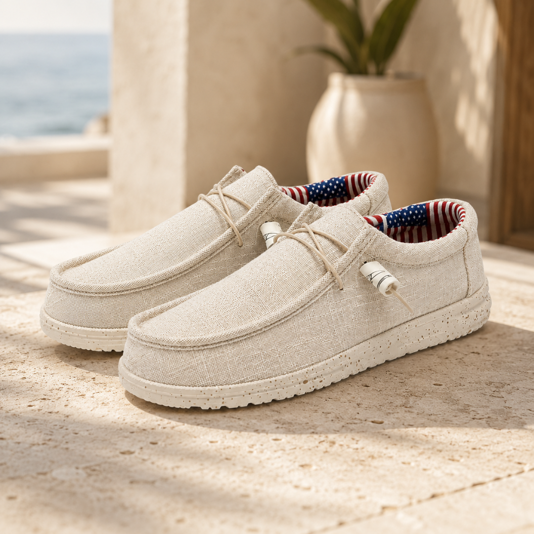 Chaussures homme blanches au soleil, bout arrondi surpiqué et lacets fins élastiques