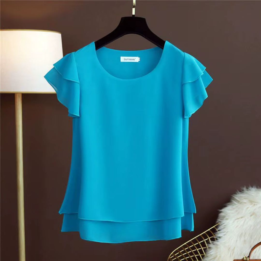 Chemisier femme bleu à volants en cascade et coupe évasée superposée
