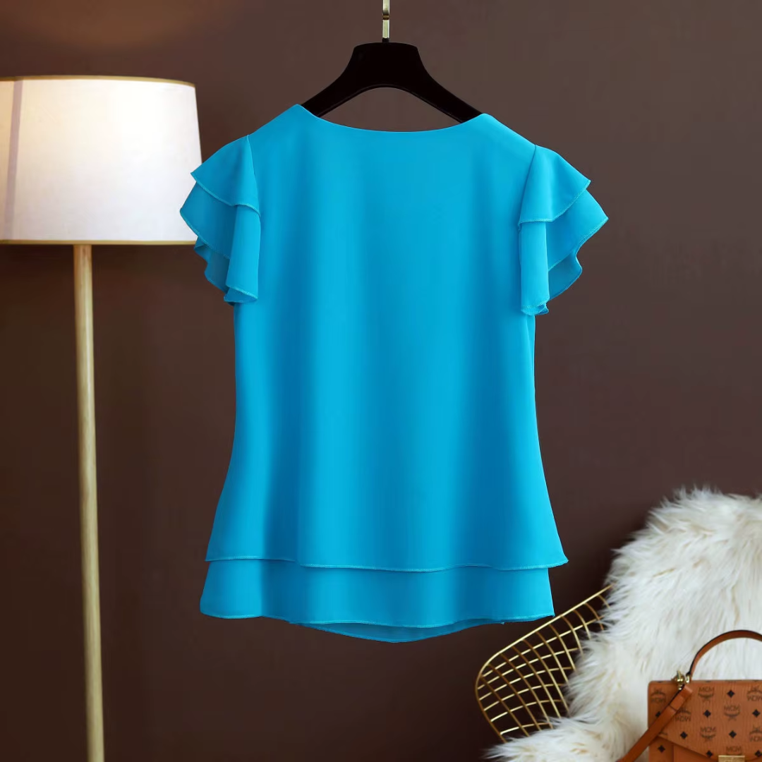 Blouse bleu femme manches courtes à double volant, col rond, vue latérale