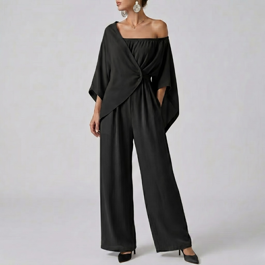 Combinaison femme noir nœud central épaule asymétrique vue entière