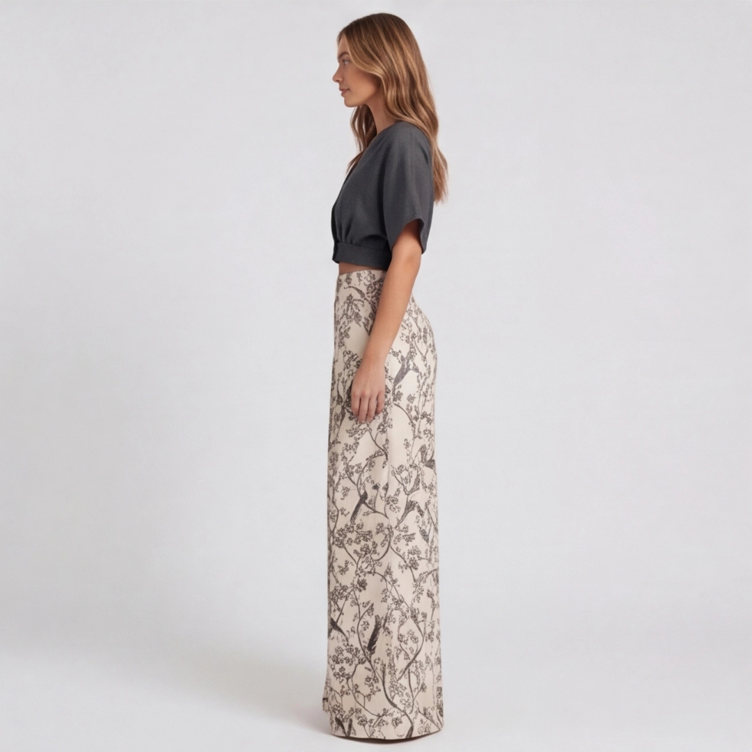 Vue de dos de l'ensemble femme top noir et pantalon wide-leg floral