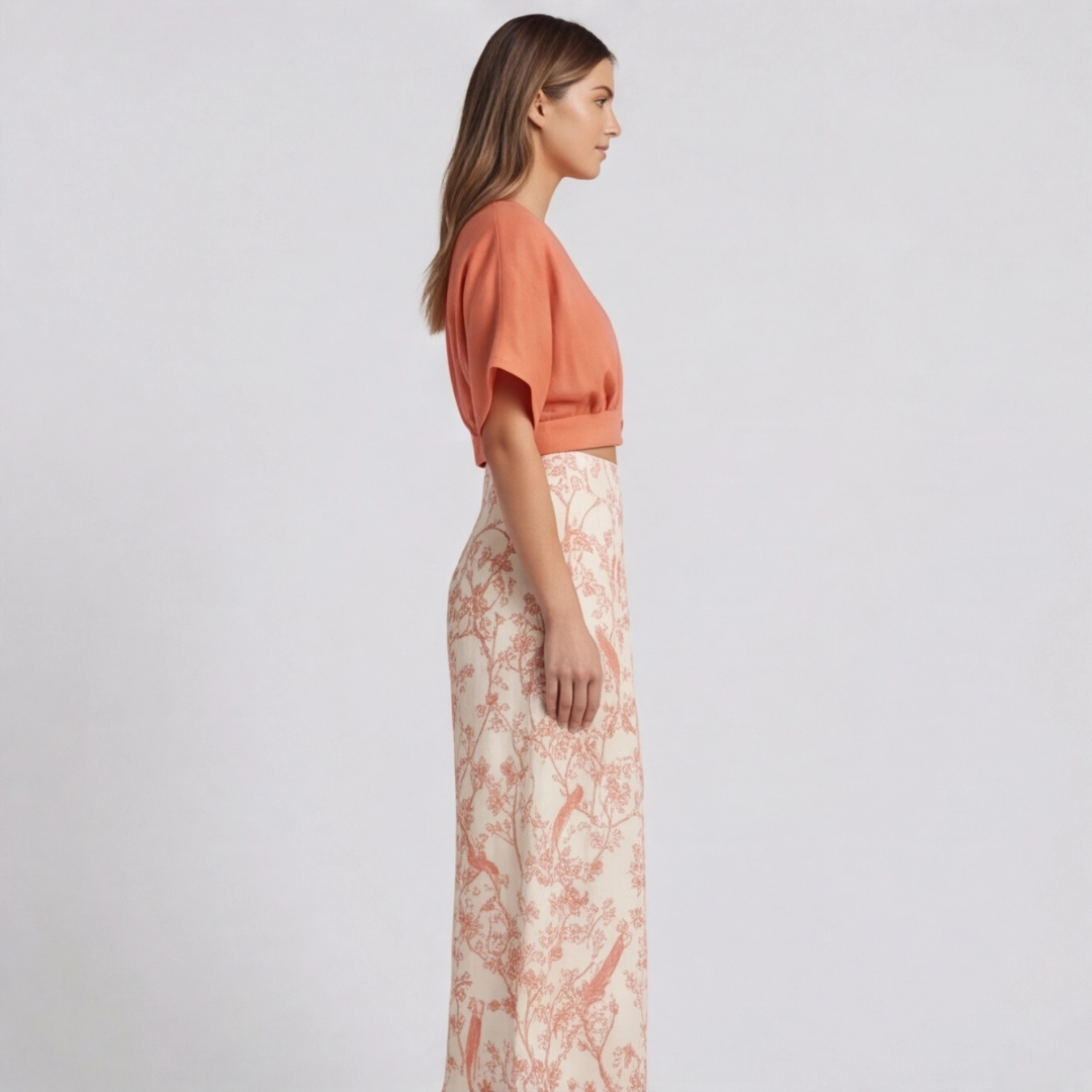 Ensemble femme top orange manches courtes et pantalon fluide floral, profil droit