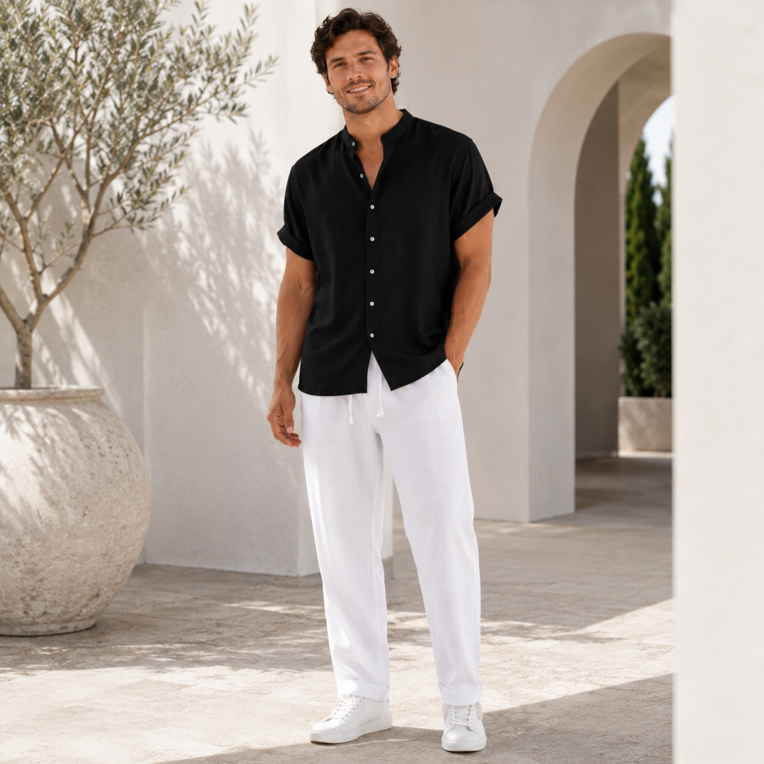 Ensemble homme chemise noire à col montant et pantalon blanc, style épuré