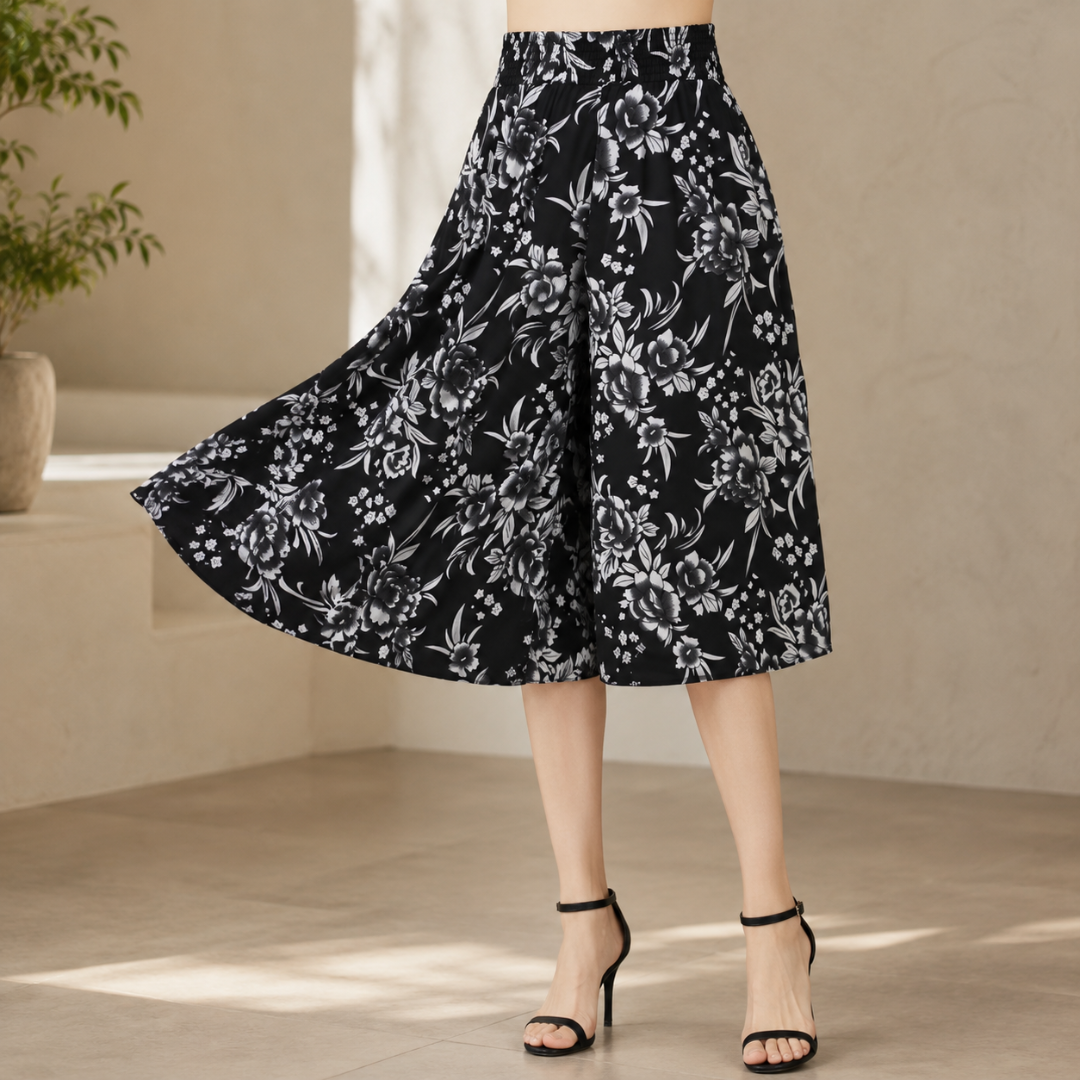 Jupe-culotte noire à fleurs grises et blanches, taille haute et tombé fluide