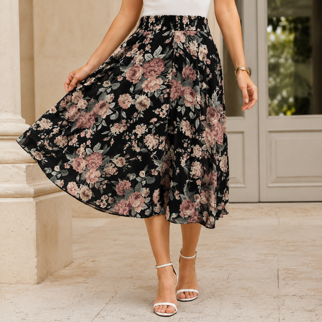 Jupe-culotte noire à roses roses et feuillage, longueur mi-mollet virevoltante