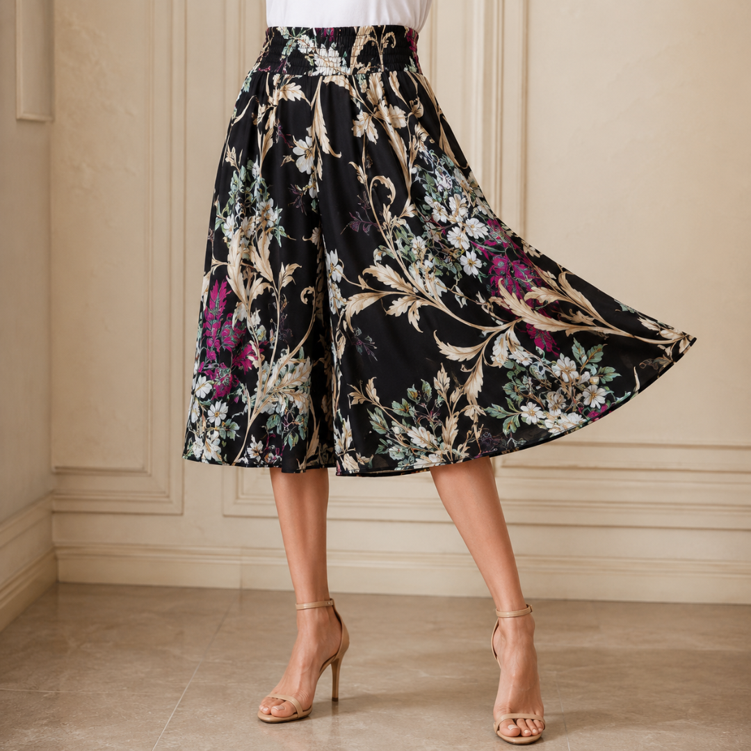 Jupe-culotte noire à motif floral beige et magenta, coupe ample et fluide