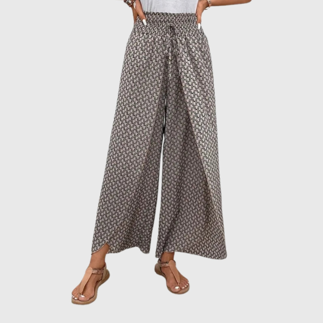 Pantalon imprimé noir et blanc coupé aux hanches, détail taille