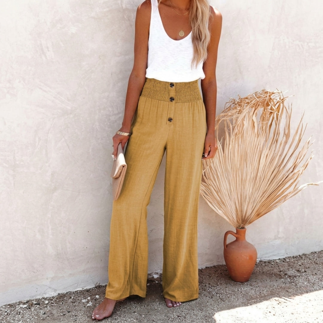 Pantalon large femme taille haute couleur moutarde avec rangée de boutons dorés