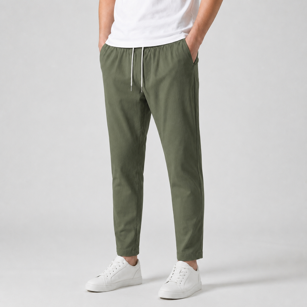 Pantalon homme coupe slim vert avec cordon de serrage blanc et poches