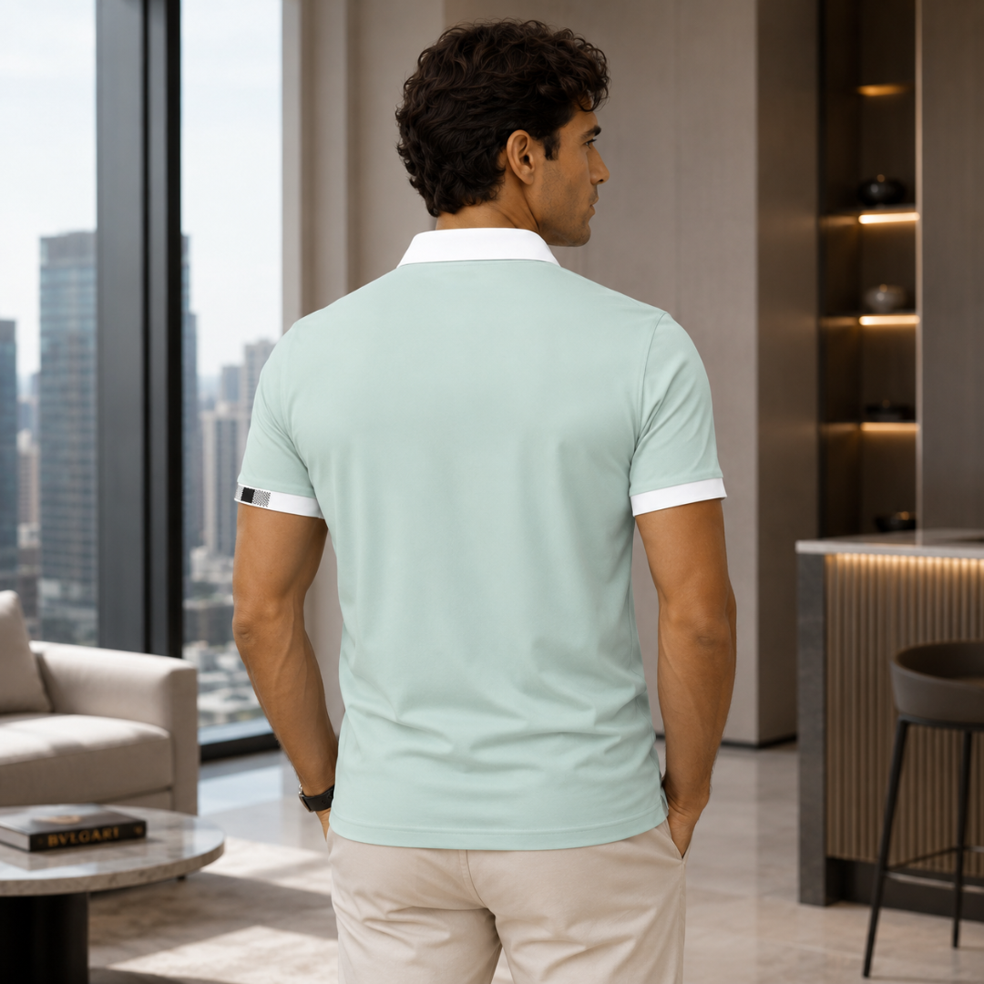 Polo homme vert menthe col contrasté, vue face entière fond urbain