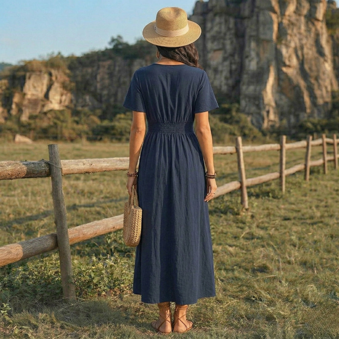 Robe longue bleu Tibétain vue de dos, taille froncée élastique et jupe ample