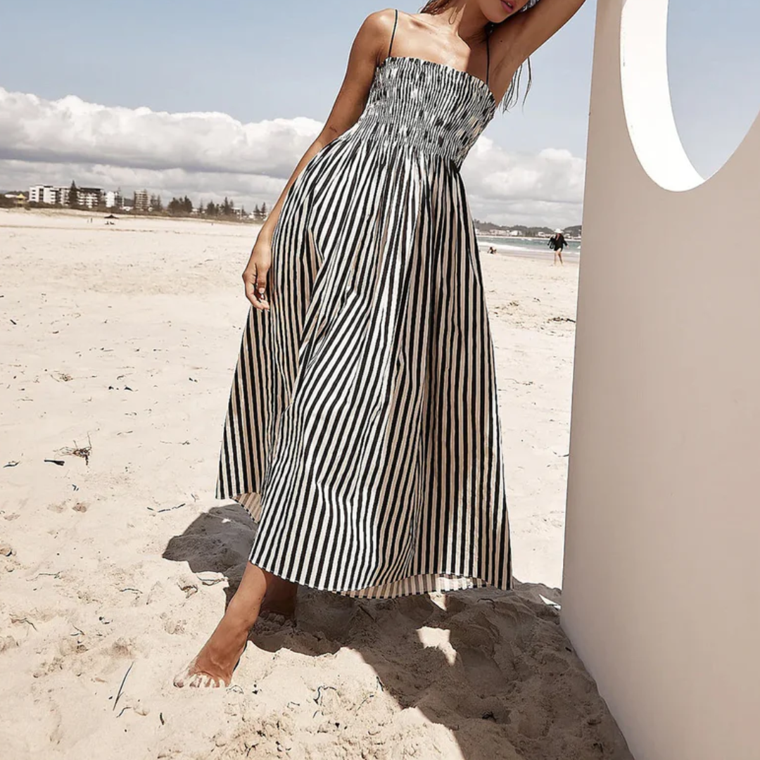 Robe midi rayée noire, vue de dos avec bretelles fines croisées