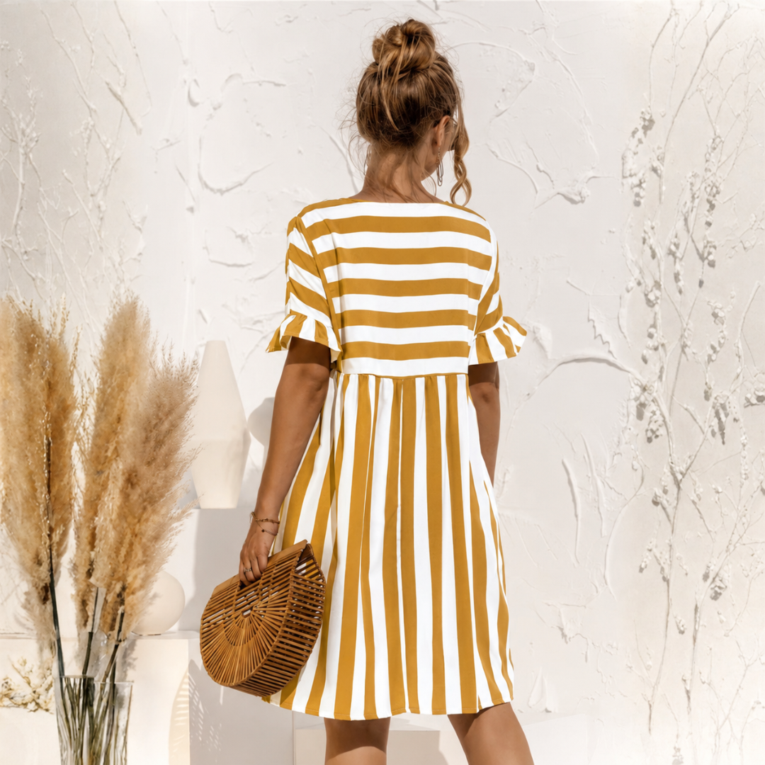 Robe midi rayée jaune et blanc coupe empire vue de côté