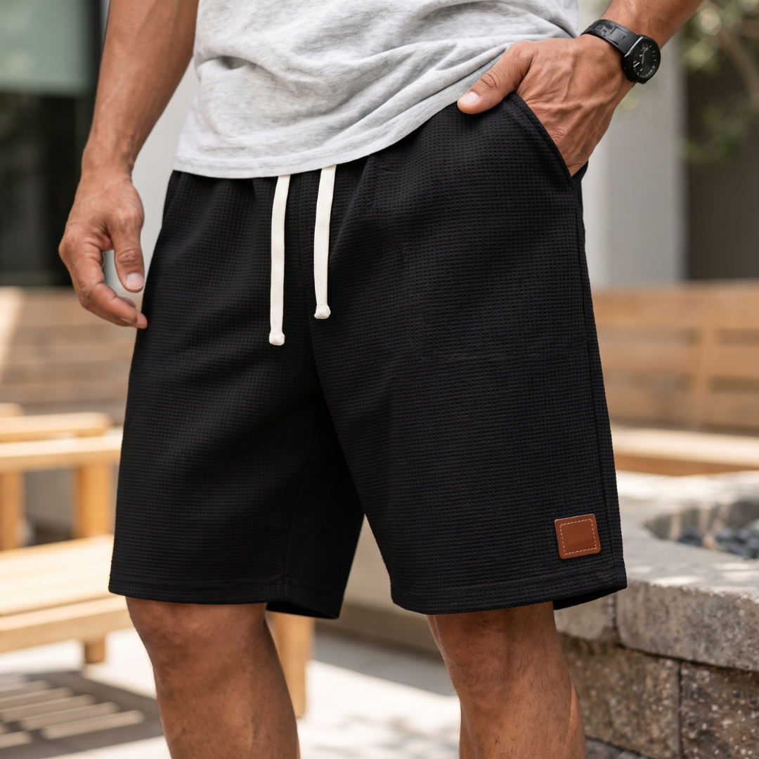 Short homme noir avec cordon blanc, coupe décontractée taille élastiquée