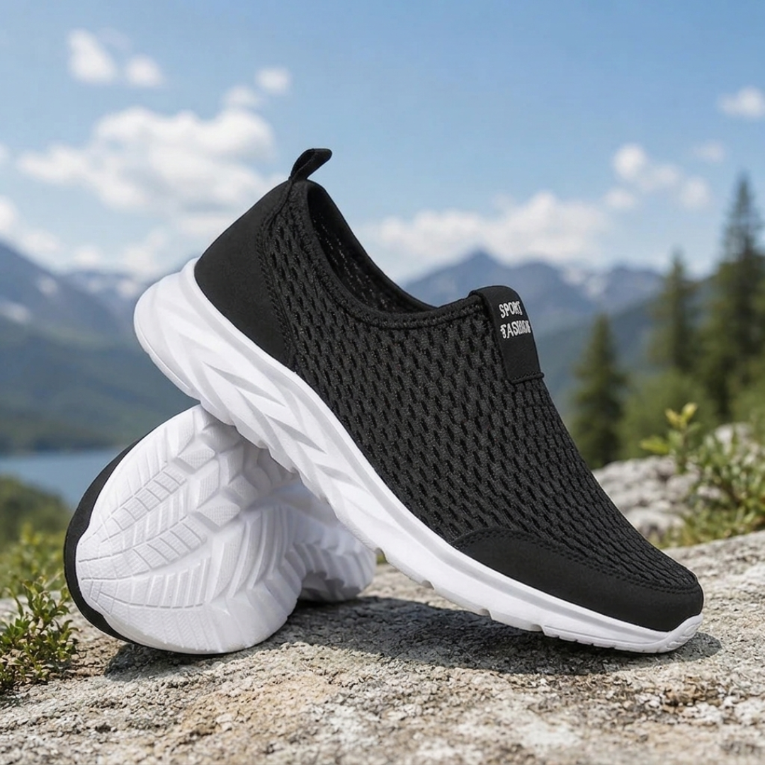 Sneakers noir et blanc sans lacets en mesh, vue de trois quarts