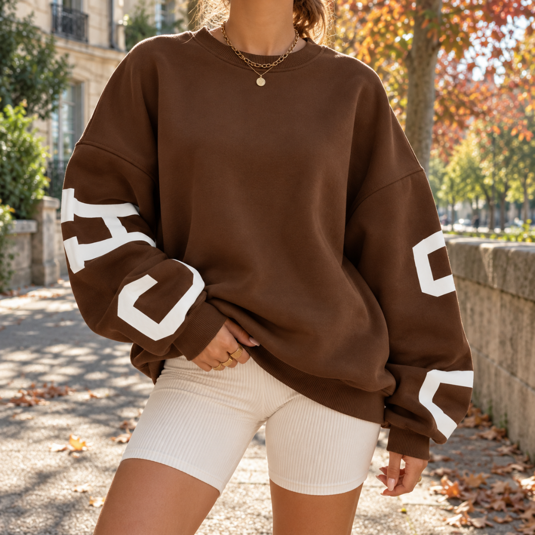 Sweat femme marron à épaules tombantes et imprimé lettres blanches aux manches