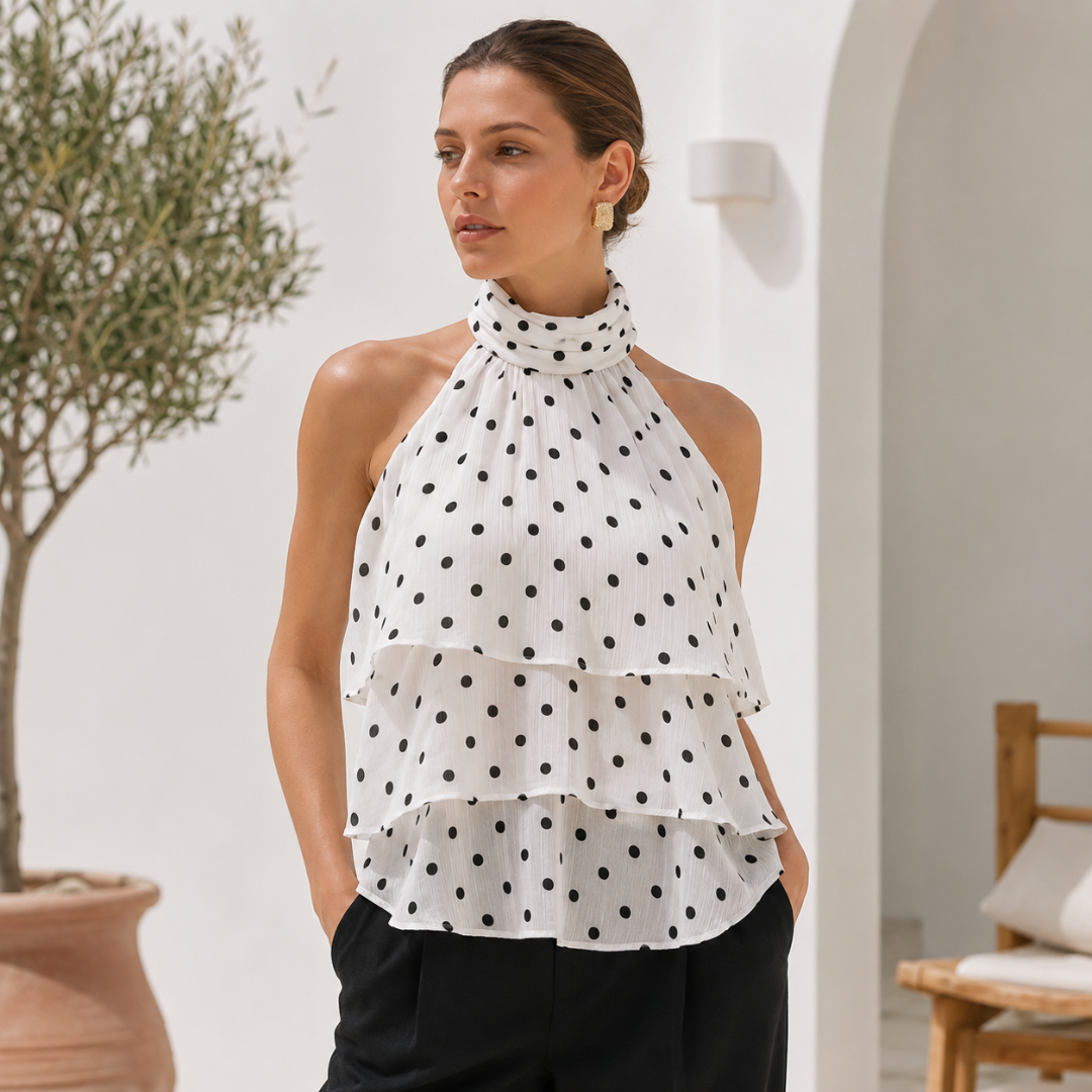 Top femme blanc à pois avec col halter et volants superposés