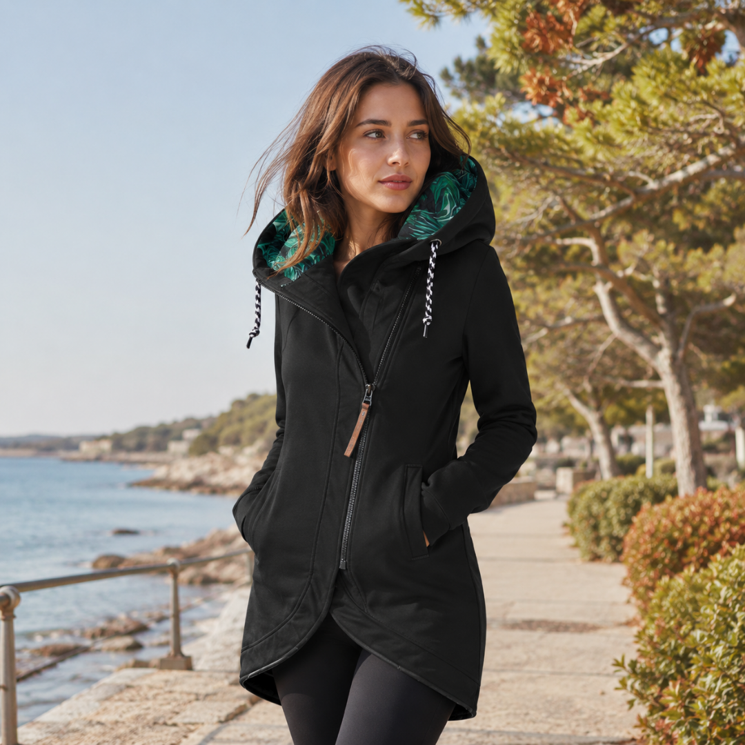 Veste longue noire à capuche à doublure imprimée, zip asymétrique et cordons de serrage tressés