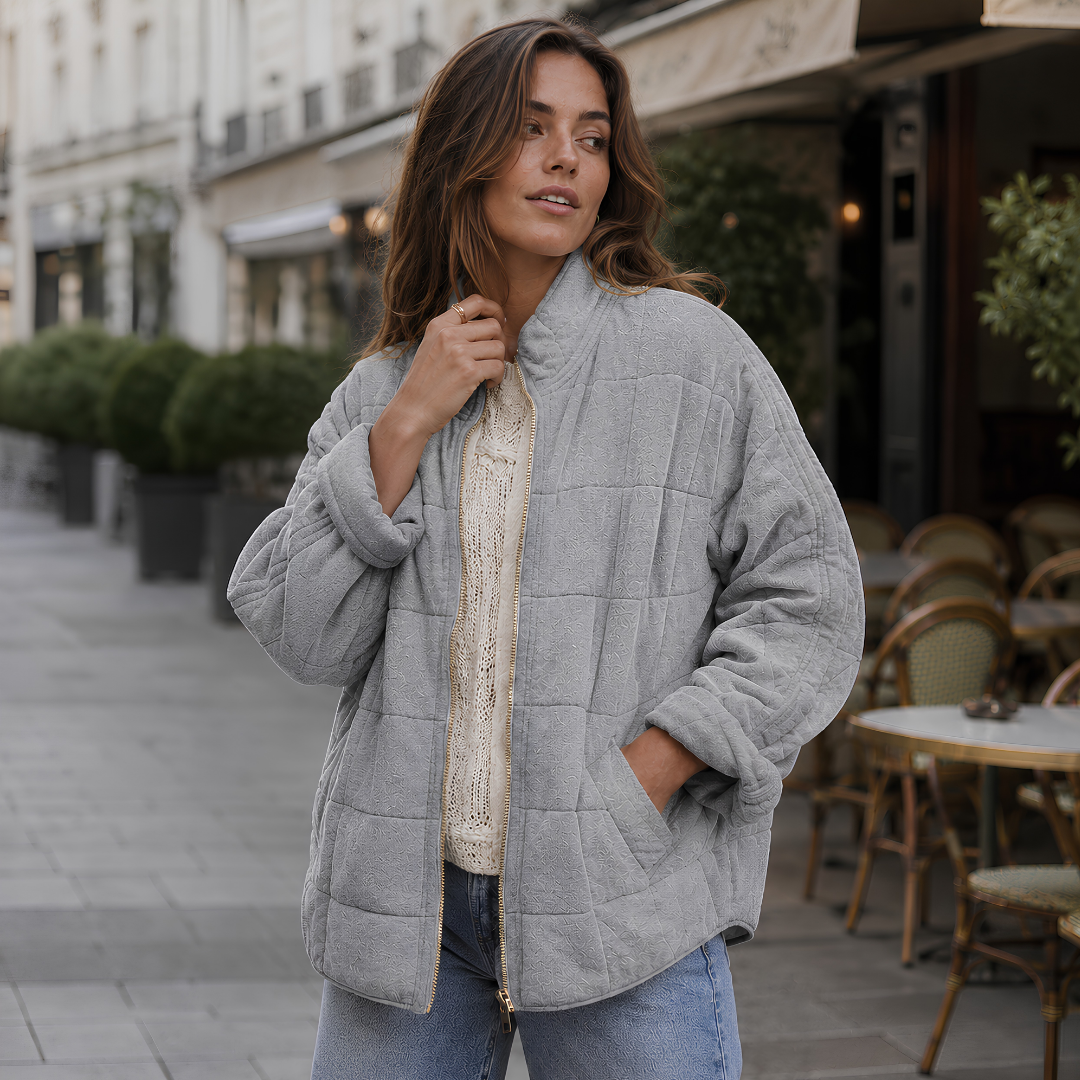 Veste matelassée gris clair chiné à col montant et poches latérales