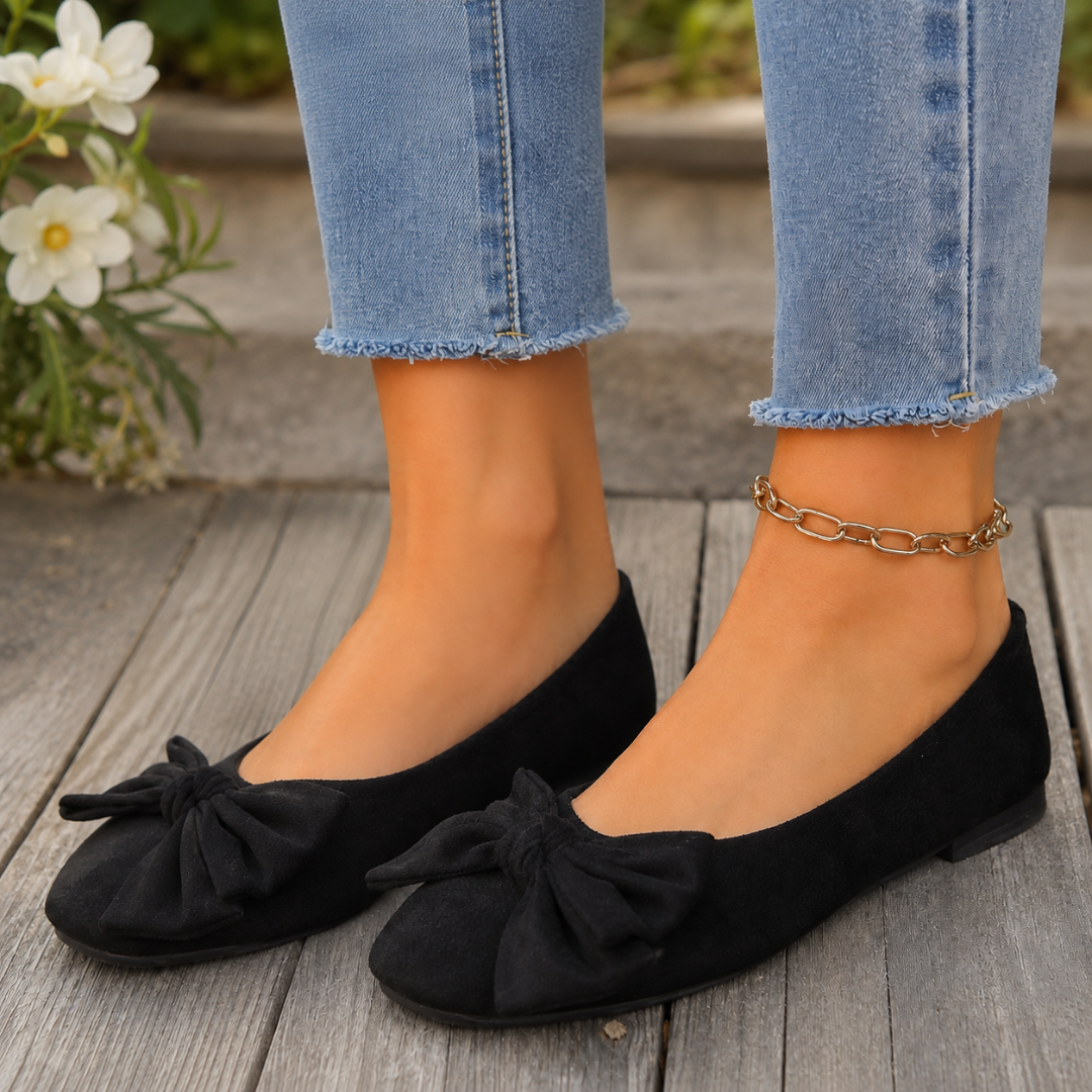 Ballerines femme noires plates à noeud, bout rond et tige basse échancrée