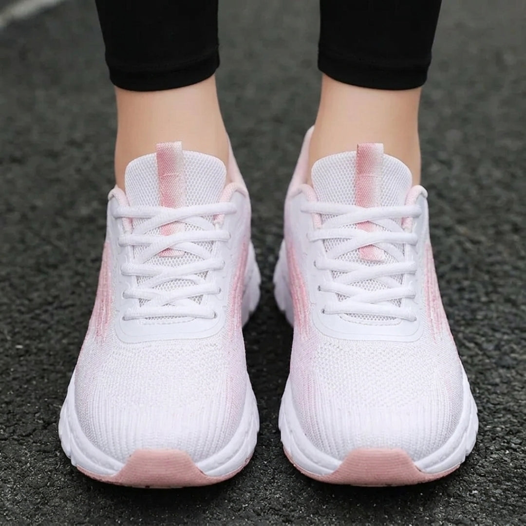 Basket femme blanche avec rayures roses vue de profil fond blanc