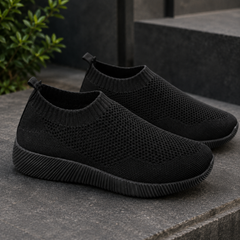 Baskets femme noires à enfiler, tige ajourée et semelle striée noire