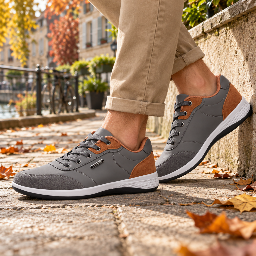 Baskets homme grises à lacets avec détails marron et semelle blanche épaisse