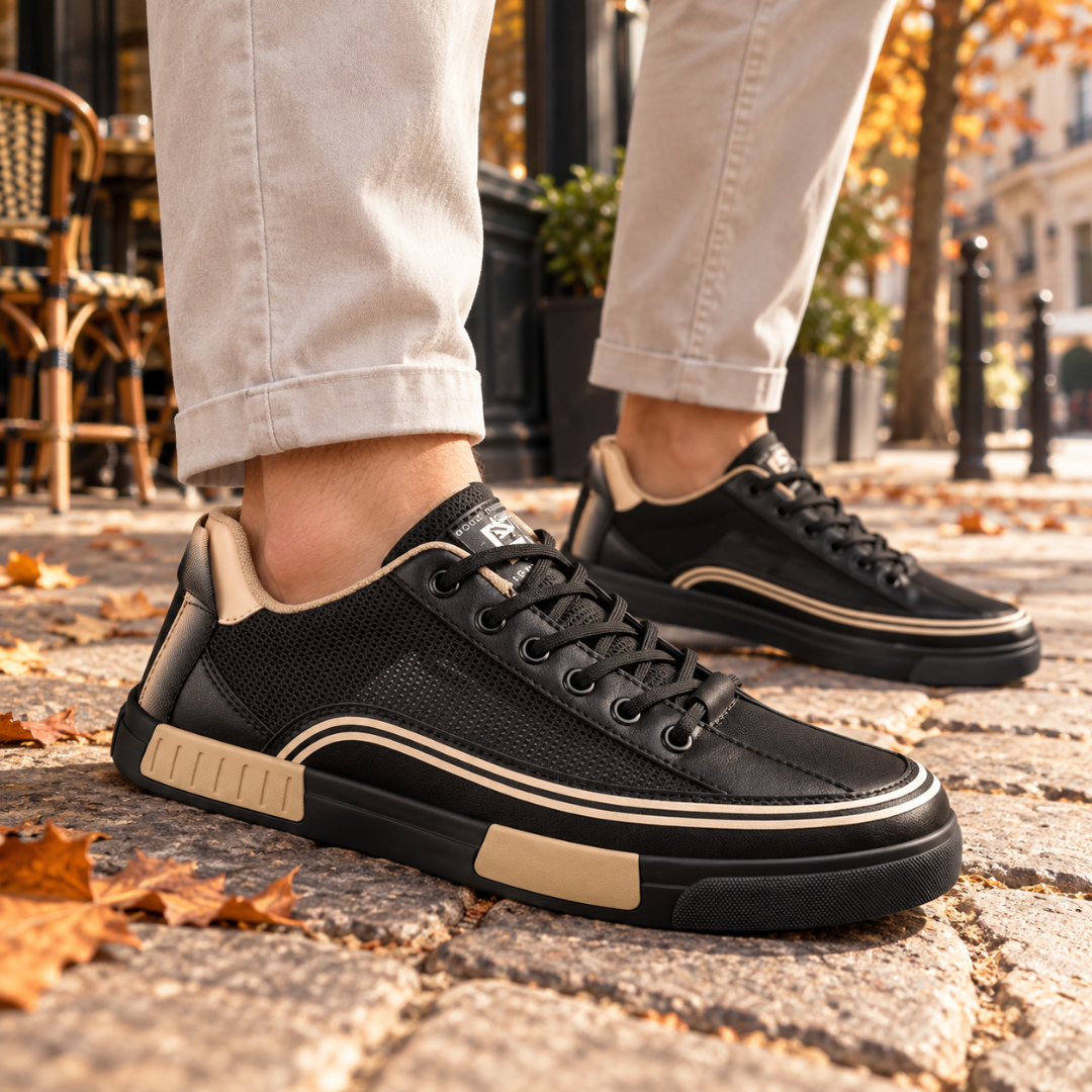 Baskets homme noires à détails beiges, lacets foncés et semelle à rayures