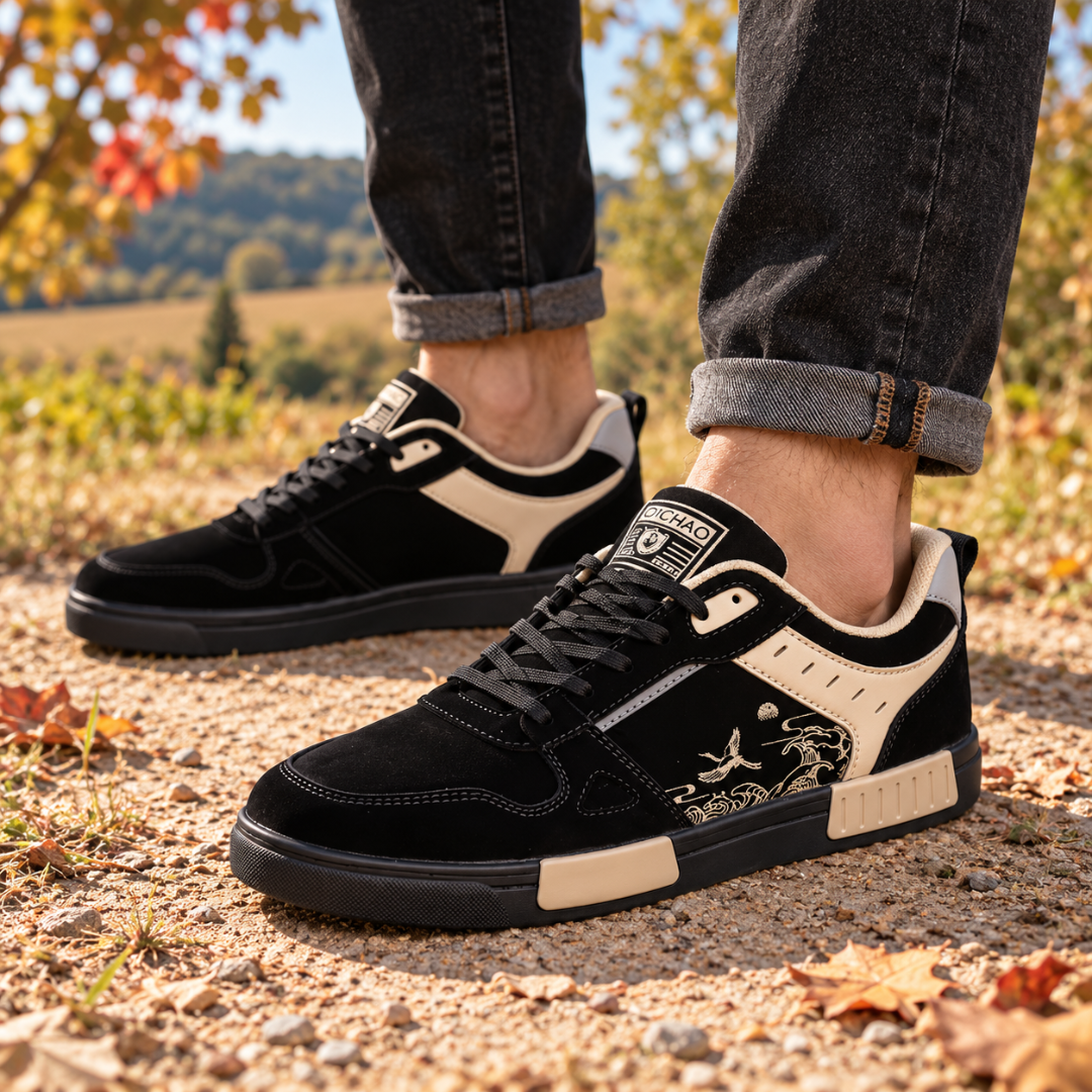 Baskets homme noires à empiècements beiges et imprimé grue sur le côté