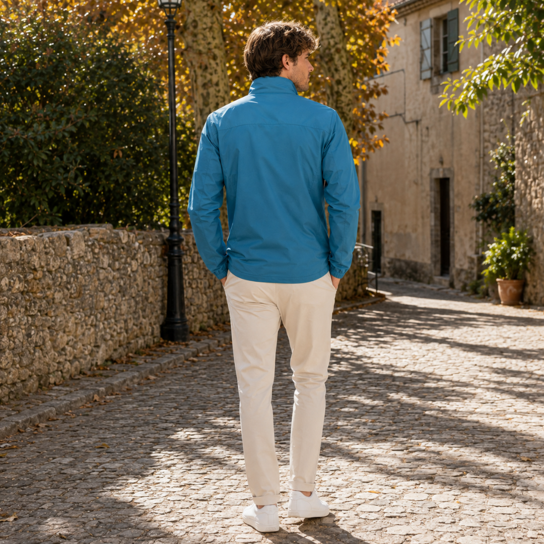 Dos du blouson homme bleu pétrole avec col montant et découpe horizontale aux épaules