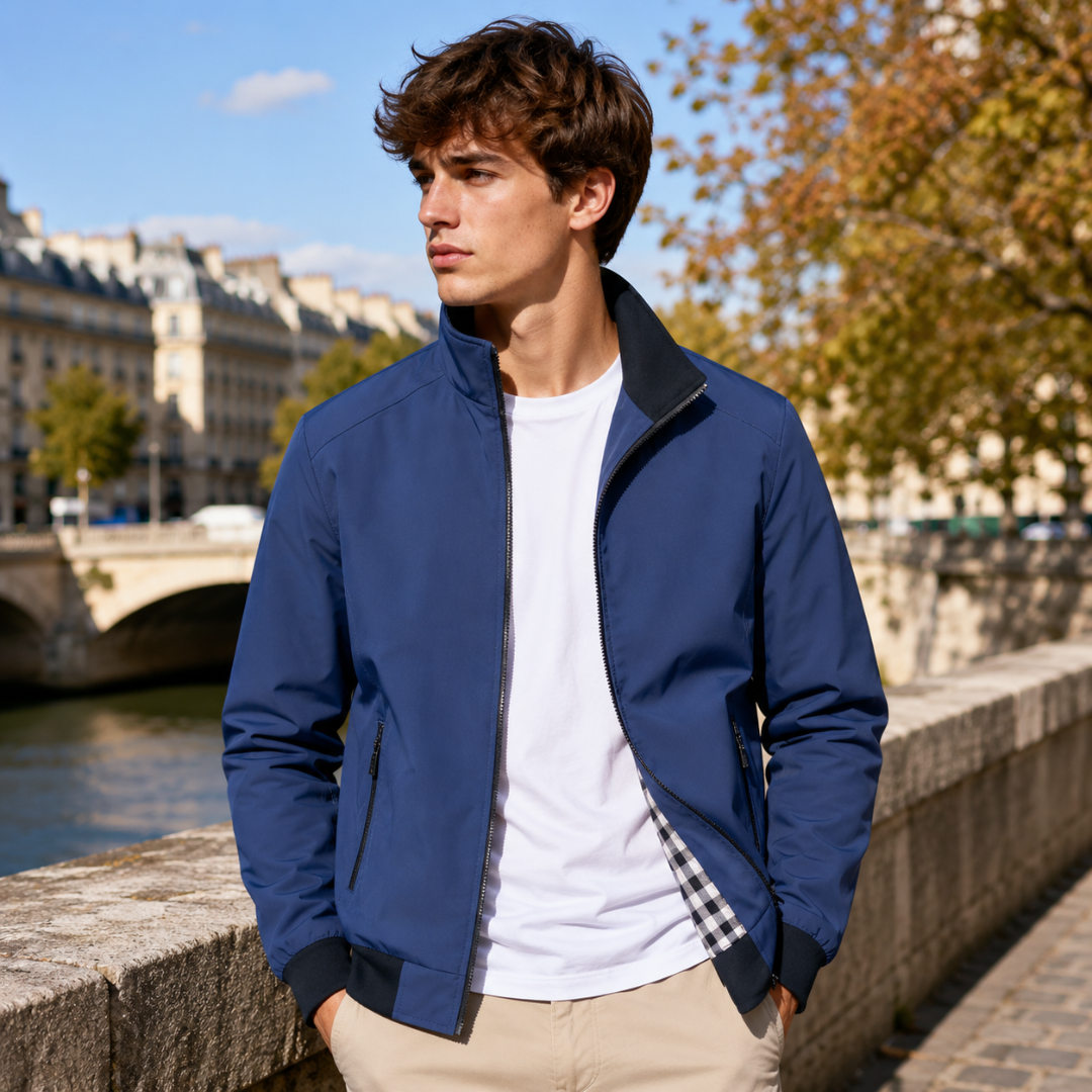 Blouson homme bleu zippé avec col montant noir et carreaux visibles à l'ouverture