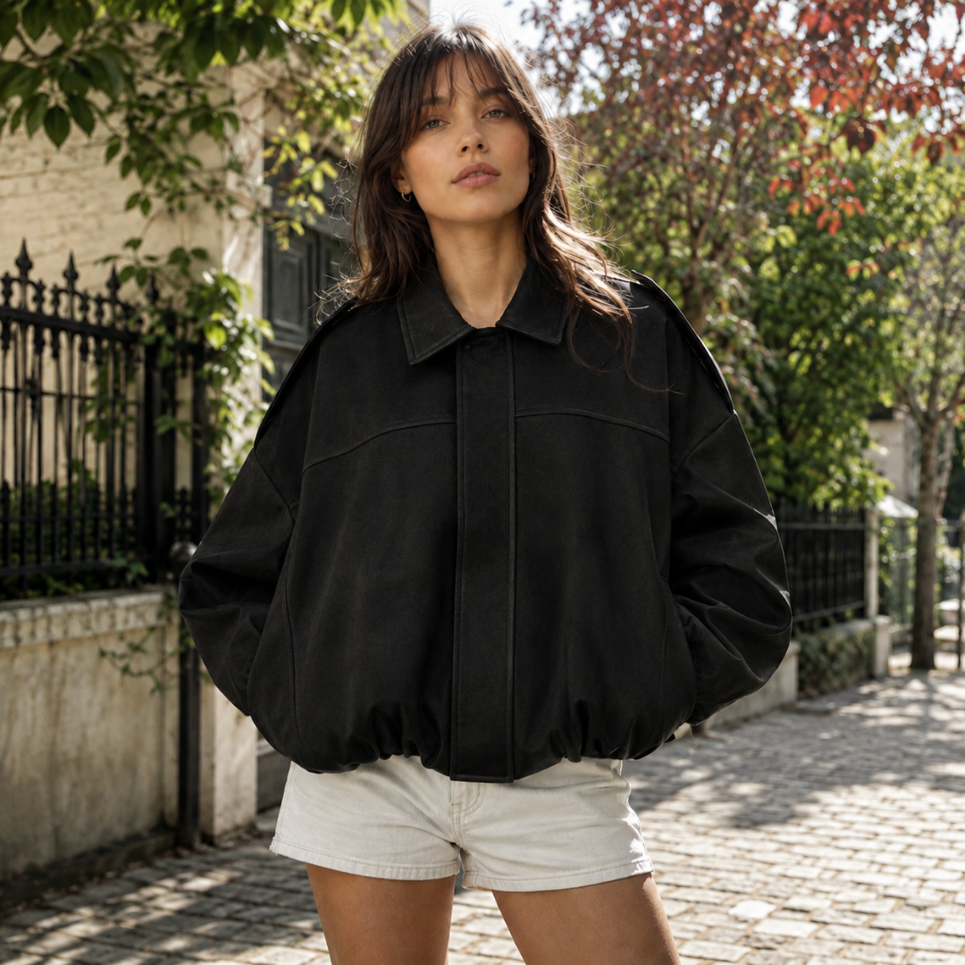 Bomber femme noir à col chemise, fermeture dissimulée et épaules tombantes
