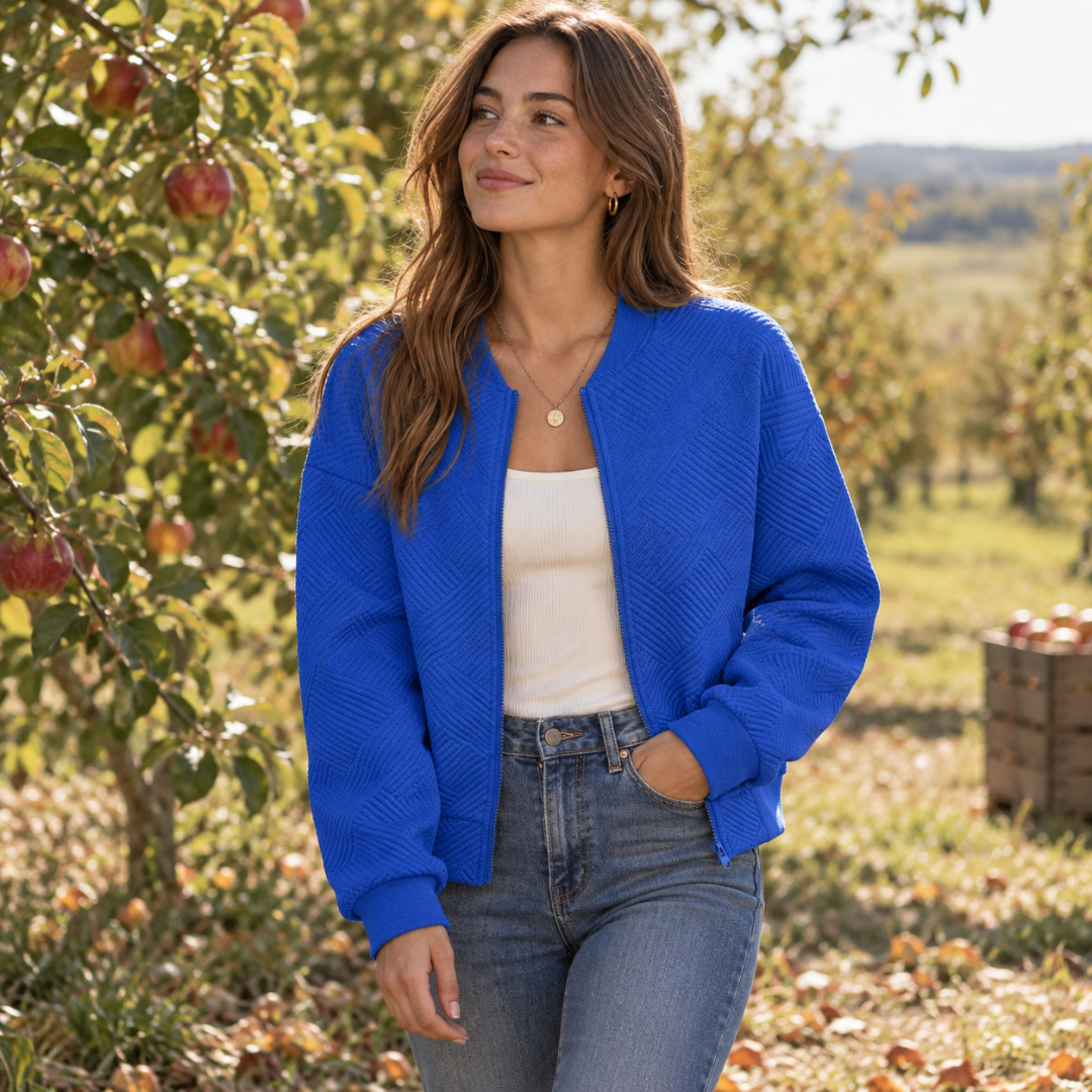 Bomber bleu roi femme en maille texturée avec col montant côtelé