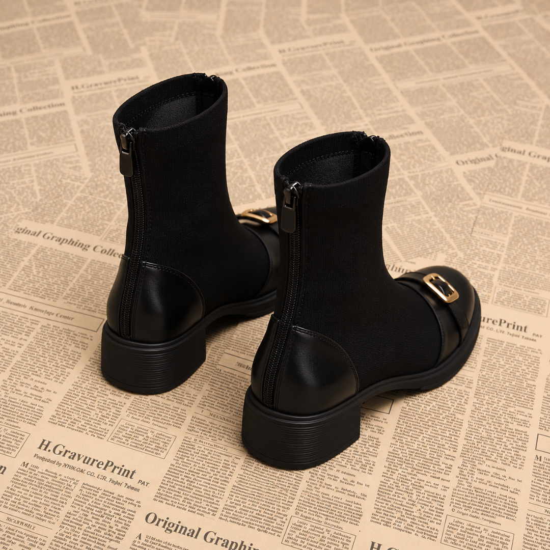 Bottines noires vues de dos, zip arrière et talon bloc à semelle striée