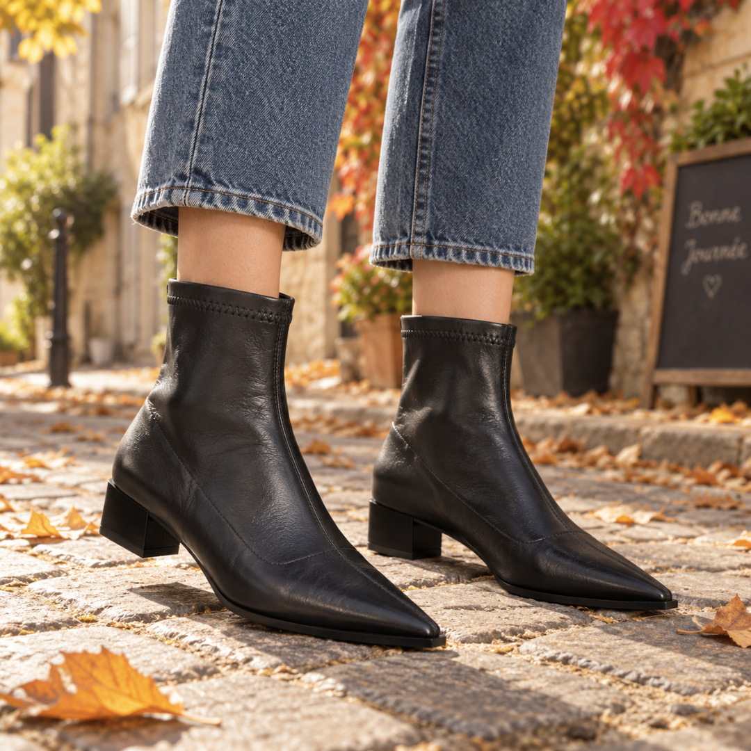 Bottines femme noires à bout pointu et tige montante au-dessus de la cheville