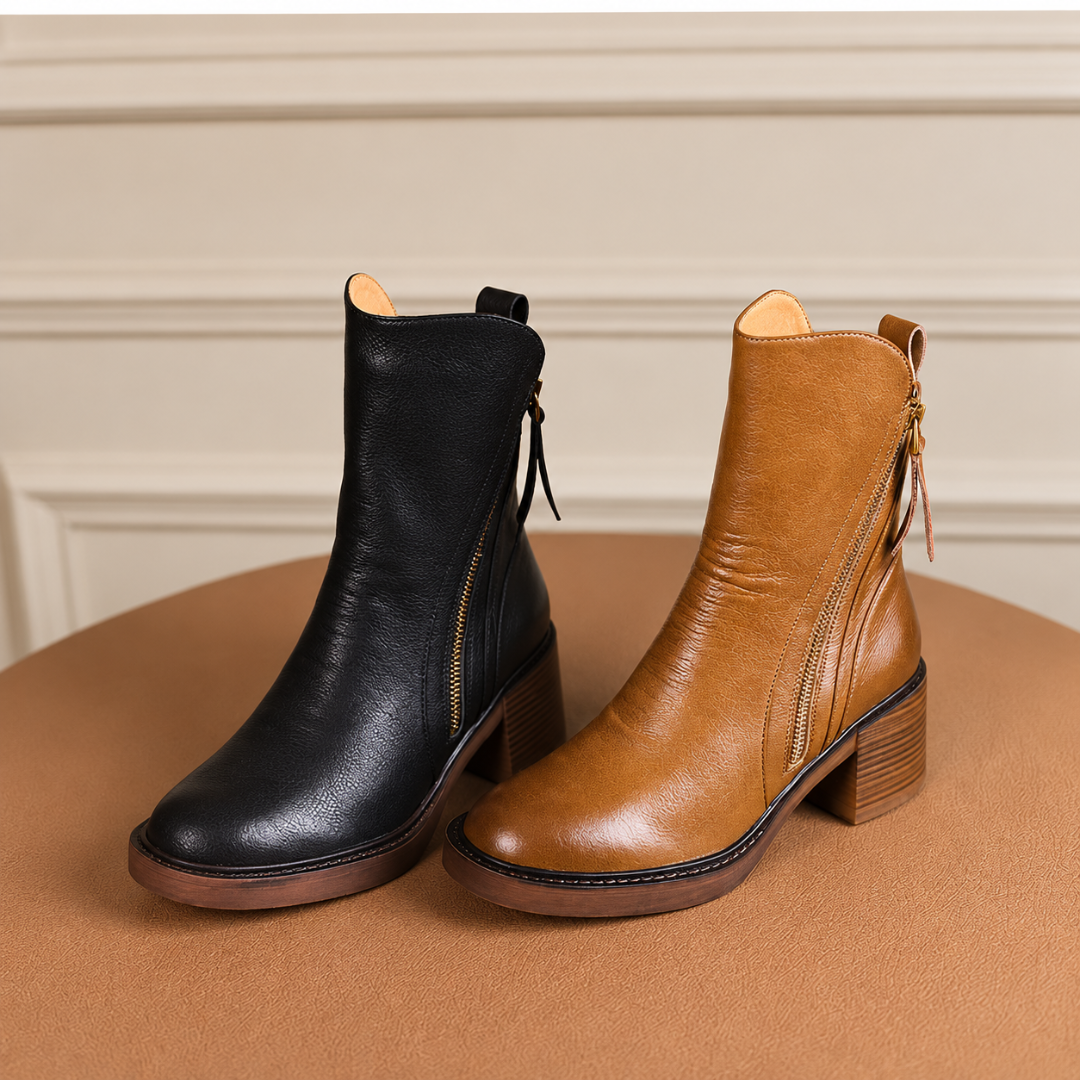 Bottines marron et noires côte à côte, tirette au talon et semelle contrastée