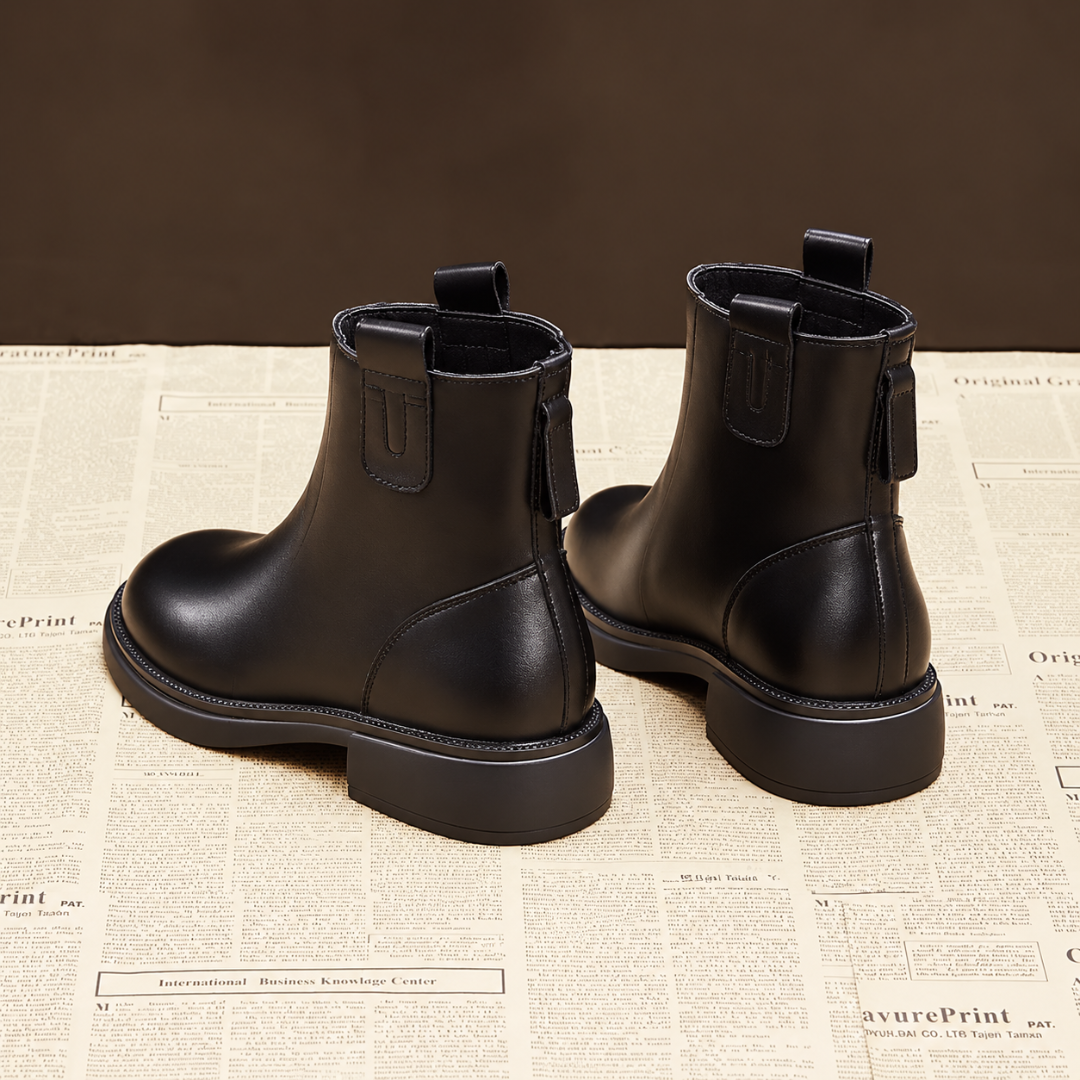 Bottines femme noires vues de dos avec fermeture zippée et languette haute