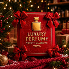 Coffret rouge du calendrier de l'Avent parfum avec quatre nœuds rouges et décorations de Noël