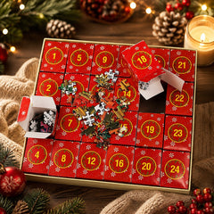 Coffret ouvert du calendrier de l'Avent avec 24 boîtes rouges numérotées et pièces de puzzle