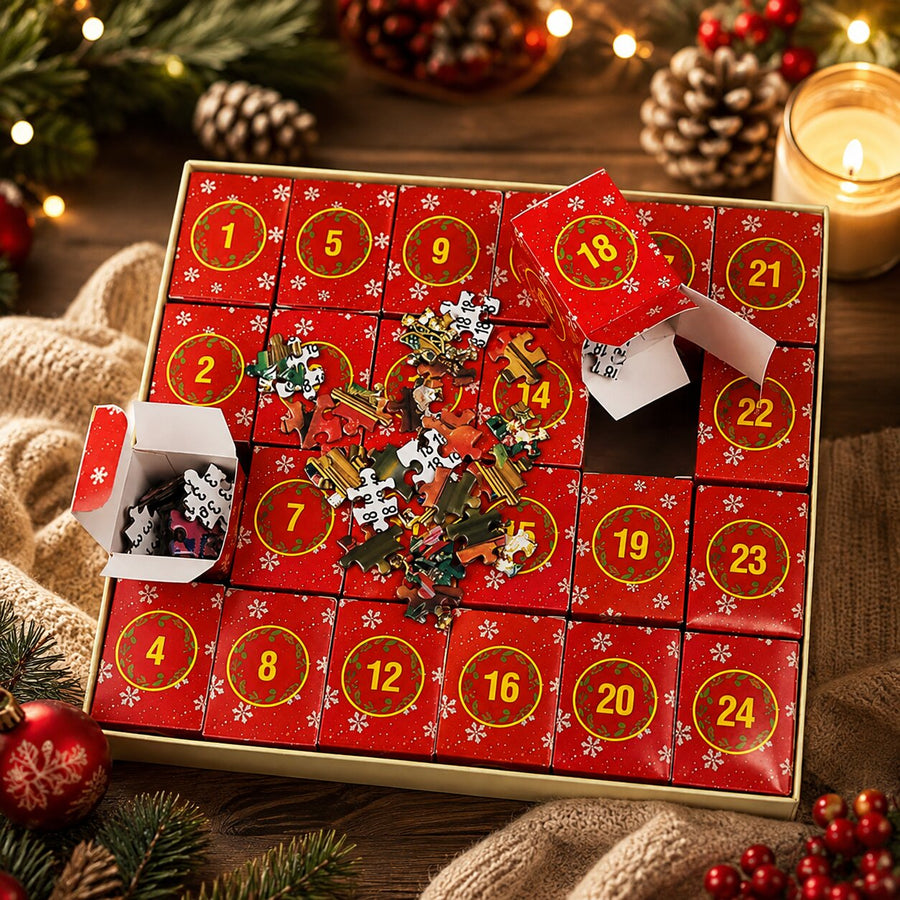 Coffret ouvert du calendrier de l'Avent avec 24 boîtes rouges numérotées et pièces de puzzle
