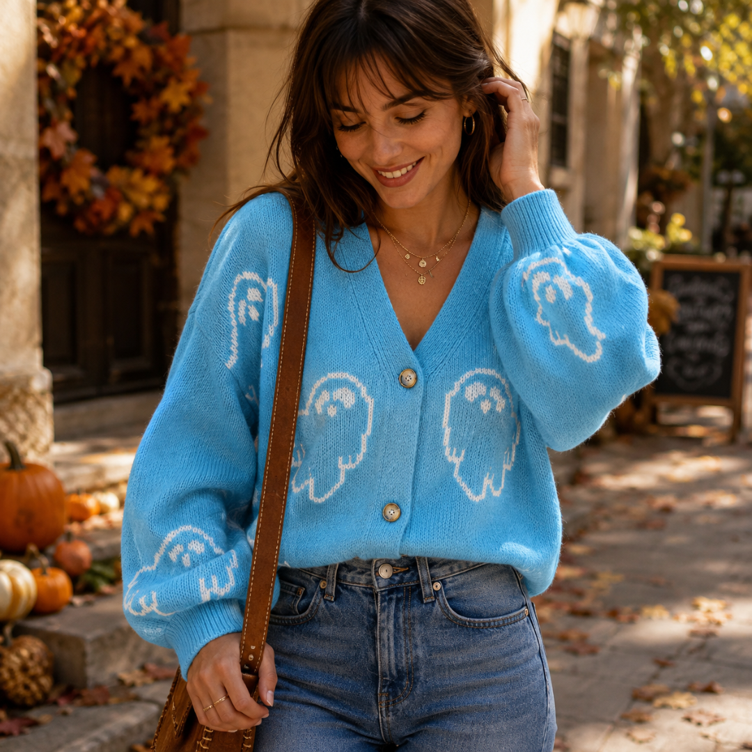 Cardigan femme bleu à motifs fantômes blancs, col V et boutons sur le devant