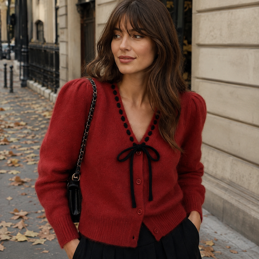 Cardigan rouge boutonné avec bordure noire contrastée et nœud noir