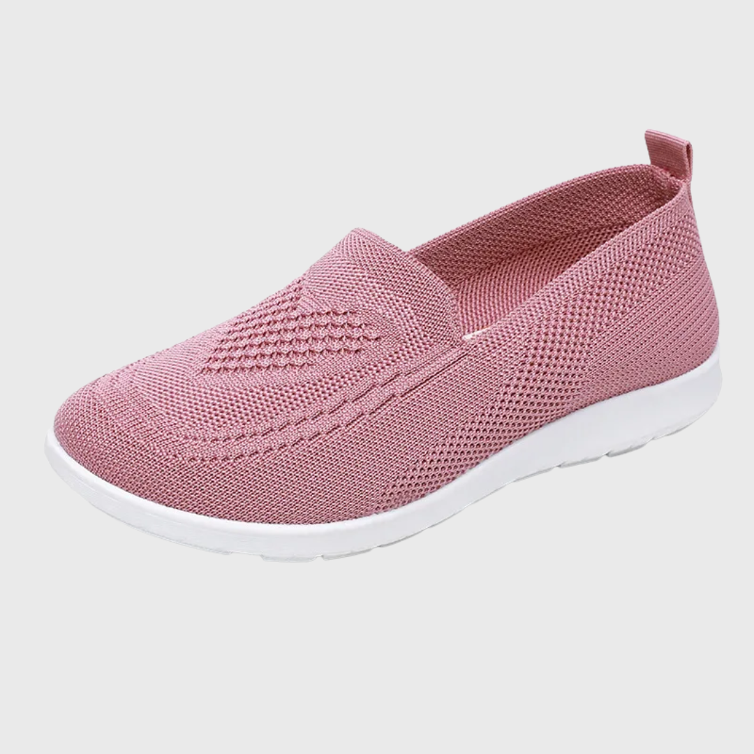 Chaussure slip-on tricot rose avec semelle blanche, vue latérale