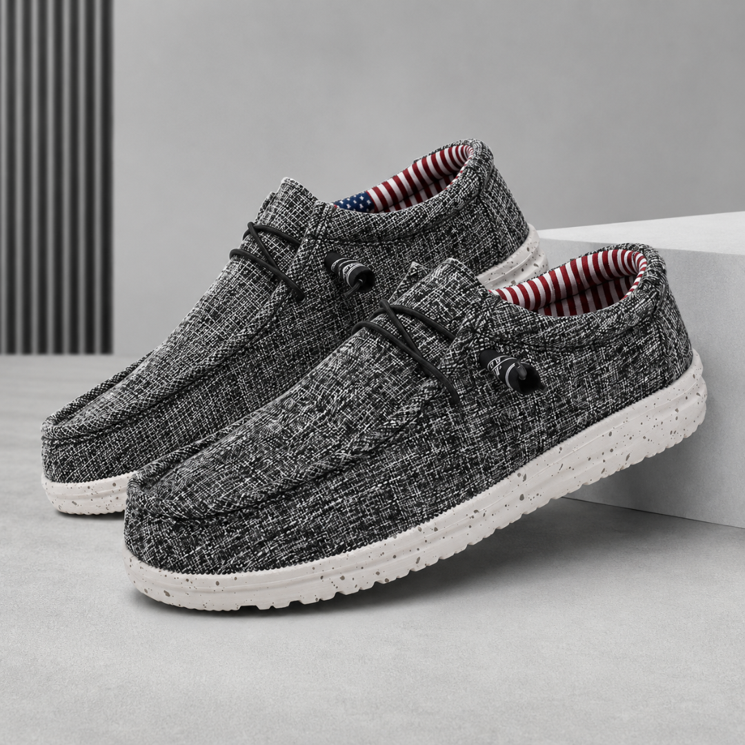 Chaussures homme gris foncé chinées, col rembourré rayé et semelle blanche crantée
