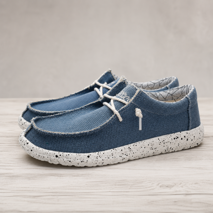 Chaussures homme slip-on bleues à laçage blanc et semelle mouchetée