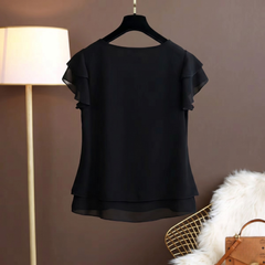 Blouse noire femme col rond avec double volant sur les manches, sur cintre