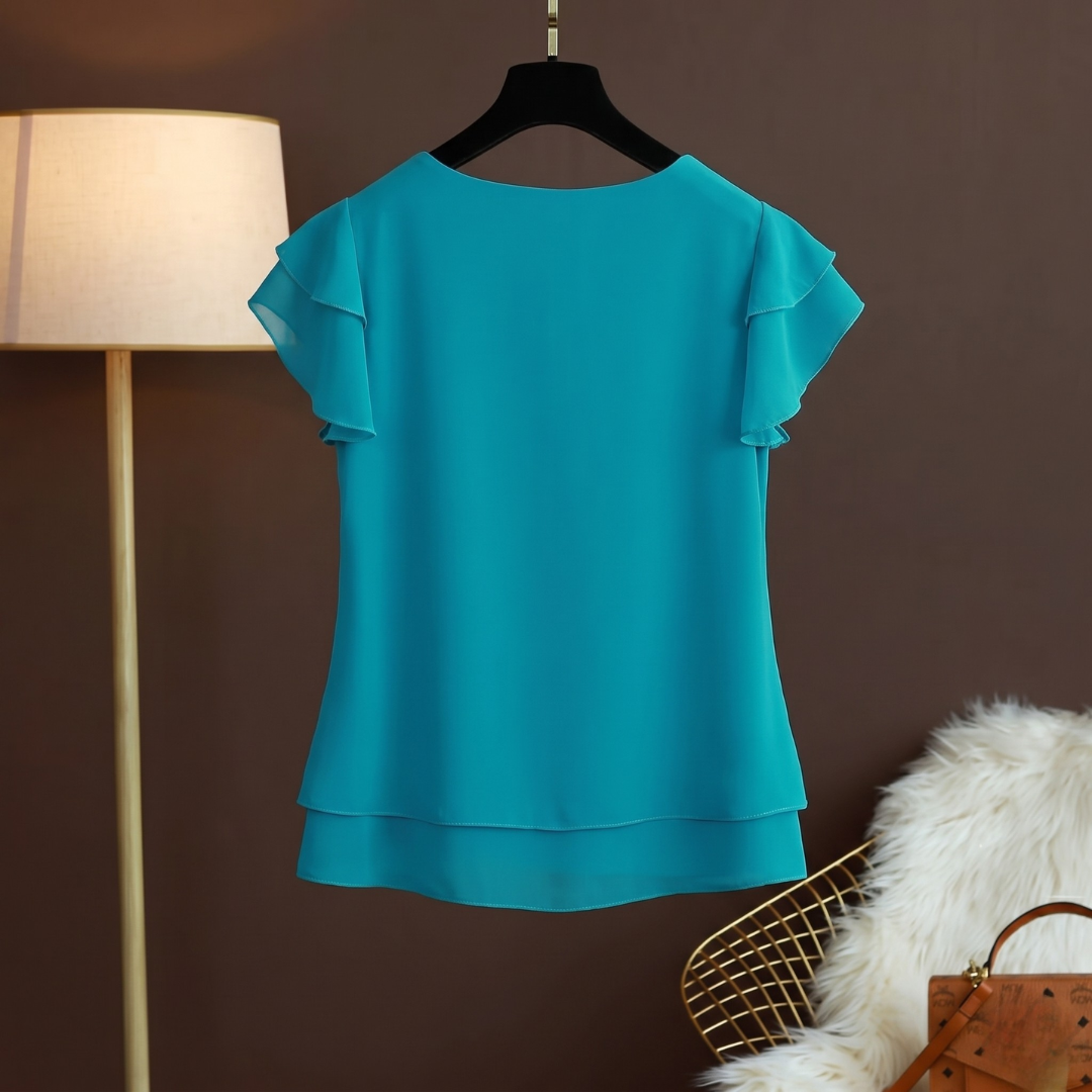 Blouse bleu paon femme col rond avec double volant sur les manches
